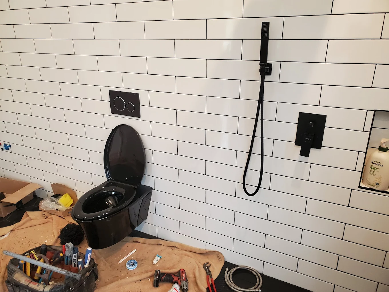 Modern black bathroom fixture install